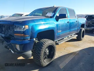 2017 Chevrolet Silverado 1500 LT with VIN 3GCUKREC8HG354004, listed as a IAAI auction lot 41429597 with 77,493 mi miles and . Bid and sale history available at DreamBid. Image 14.