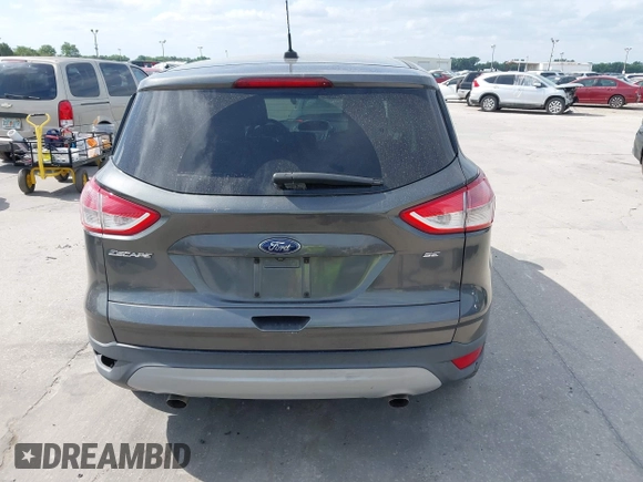 2015 Ford Escape SE with VIN 1FMCU0G7XFUA89965, listed as a IAAI auction lot 42072553 with 129,877 mi miles. Bid and sale history available at carsss.com. Image 16.