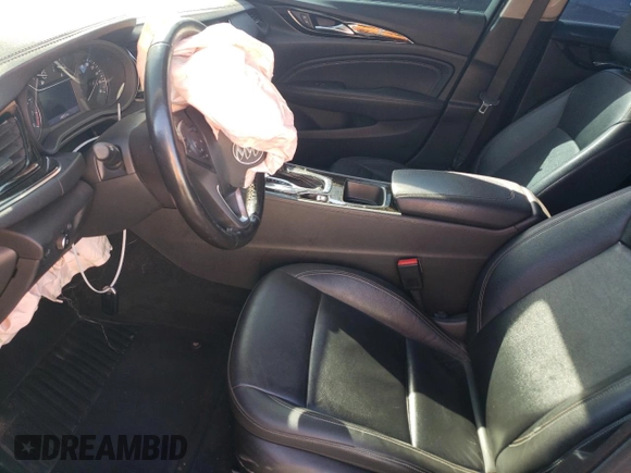 2019 Buick Regal Essence with VIN W04GP6SX0K1030338, listed as a Copart auction lot 74726264 with 148,531 mi miles and Salvage title. Bid and sale history available at DreamBid. Image 7.