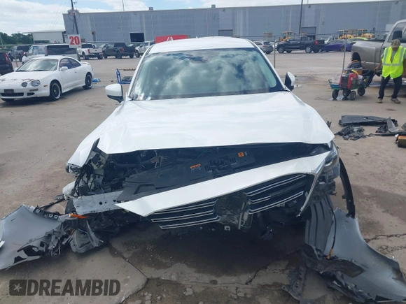 2022 Mazda CX-9 Touring with VIN JM3TCBCY0N0608052, listed as a IAAI auction lot 42027465 with 65,313 mi miles and . Bid and sale history available at DreamBid. Image 12.