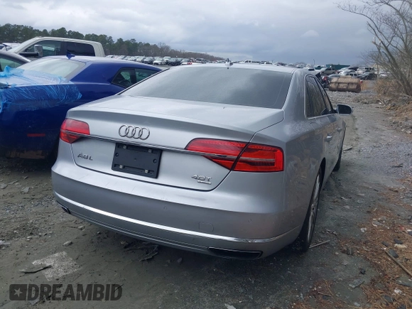 2015 Audi A8 L 4.0T with VIN WAU32AFD7FN021203, listed as a IAAI auction lot 41736045 with 135,471 mi miles. Bid and sale history available at carsss.com. Image 4.