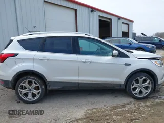 2019 Ford Escape Titanium with VIN 1FMCU9J97KUB85528, listed as a IAAI auction lot 41708344 with 88,841 mi miles. Bid and sale history available at carsss.com. Image 13.