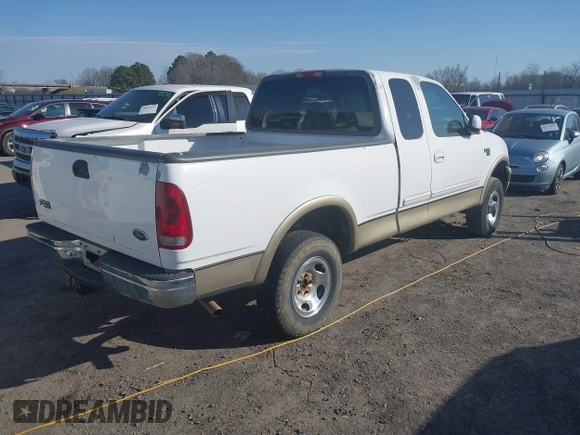 1999 Ford F-150 XL with VIN 1FTRX18L3XKB33860, listed as a IAAI auction lot 41664761 with 305,767 mi miles. Bid and sale history available at carsss.com. Image 4.