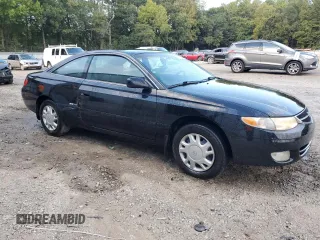 1999 Toyota Solara SE with VIN 2T1CF22P6XC159638, listed as a Copart auction lot 71815564 with 217,196 mi miles and Salvage Title. Bid and sale history available at DreamBid. Image 4.