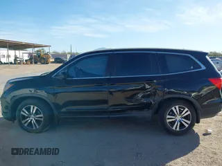 2017 Honda Pilot EX-L with VIN 5FNYF6H54HB063619, listed as a IAAI auction lot 41545415 with Not Provided miles and . Bid and sale history available at DreamBid. Image 13.