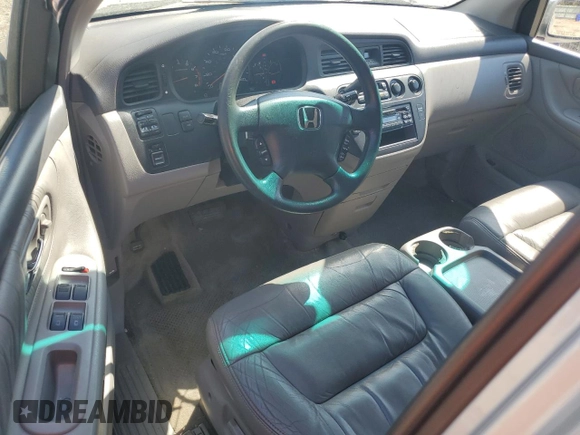 2004 Honda Odyssey EX-L with VIN 5FNRL18974B074613, listed as a Copart auction lot 48924865 with 212,633 mi miles and Salvage Title. Bid and sale history available at DreamBid. Image 8.