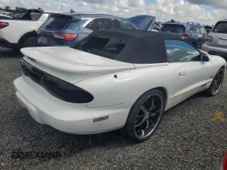 2001 Pontiac Firebird Firebird z VIN 2G2FS32K912126317, wystawiony jako Copart lot #74510454 z przebiegiem Nie podano mil oraz Szkody całkowita. Historia ofert i sprzedaży dostępna na DreamBid. Obrazek 3.