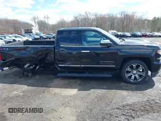 2018 Chevrolet Silverado 1500 with VIN 1GCVKSEC3JZ125571, listed as a IAAI auction lot 41982881 with 58,410 mi miles and . Bid and sale history available at DreamBid. Image 13.