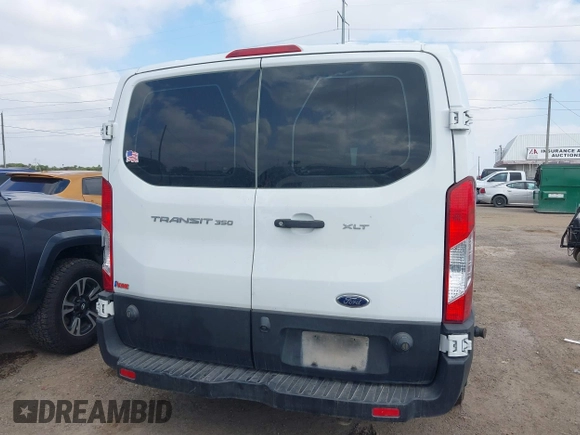 2019 Ford Transit Passenger XL with VIN 1FBZX2YM5KKA48112, listed as a IAAI auction lot 41518013 with 163,856 mi miles and . Bid and sale history available at DreamBid. Image 17.