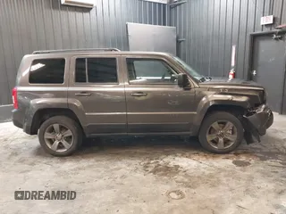2015 Jeep Patriot Latitude z VIN 1C4NJRFB4FD409149, wystawiony jako IAAI lot #42268239 z przebiegiem 107 145 mil mil oraz . Historia ofert i sprzedaży dostępna na DreamBid. Obrazek 13.