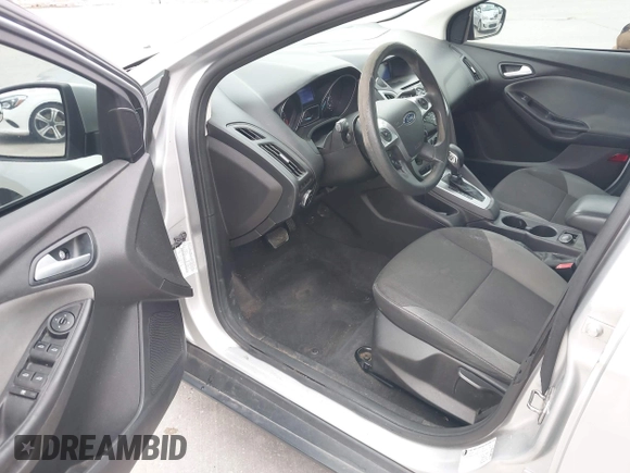 2013 Ford Focus SE z VIN 1FADP3F25DL189133, wystawiony jako IAAI lot #42438118 z przebiegiem 122 350 mil mil oraz . Historia ofert i sprzedaży dostępna na DreamBid. Obrazek 12.
