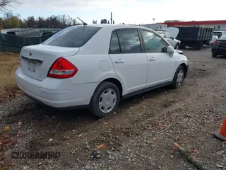 2009 Nissan Versa 1.8 S with VIN 3N1BC11E49L416720, listed as a IAAI auction lot 40960069 with 130,131 mi miles. Bid and sale history available at carsss.com. Image 4.