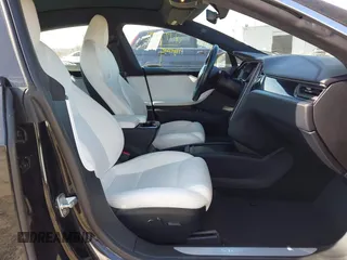 2020 Tesla Model S Long Range with VIN 5YJSA1E23LF381872, listed as a IAAI auction lot 41763046 with 96,720 mi miles and . Bid and sale history available at DreamBid. Image 5.