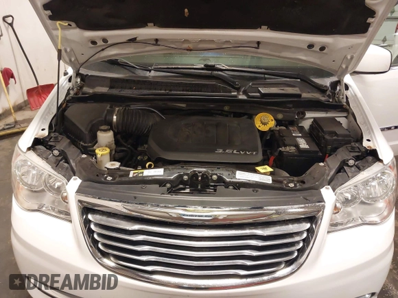 2015 Chrysler Town & Country Touring with VIN 2C4RC1BG9FR626482, listed as a IAAI auction lot 41879865 with 129,694 mi miles and . Bid and sale history available at DreamBid. Image 10.