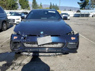 2020 BMW 5 Series 530e with VIN WBAJA9C00LCD60874, listed as a Copart auction lot 87960825 with 91,036 mi miles and Salvage Title. Bid and sale history available at DreamBid. Image 5.