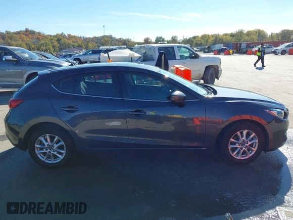 2016 Mazda 3 i Touring with VIN 3MZBM1L74GM299119, listed as a IAAI auction lot 40717069 with 63,083 mi miles and . Bid and sale history available at DreamBid. Image 13.