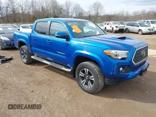 2018 Toyota Tacoma SR with VIN 3TMCZ5AN3JM136826, listed as a IAAI auction lot 41664482 with 124,731 mi miles. Bid and sale history available at carsss.com. Image 1.