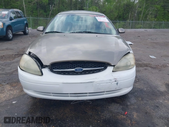 2003 Ford Taurus SE Standard with VIN 1FAFP53U63G125751, listed as a IAAI auction lot 41933803 with 196,710 mi miles. Bid and sale history available at carsss.com. Image 13.