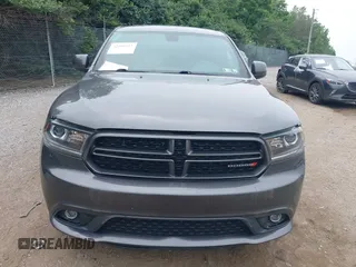 2014 Dodge Durango SXT z VIN 1C4RDJAG0EC562127, wystawiony jako IAAI lot #42456152 z przebiegiem 124 171 mil mil oraz . Historia ofert i sprzedaży dostępna na DreamBid. Obrazek 12.
