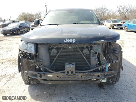 2015 Jeep Grand Cherokee Laredo with VIN 1C4RJFAG0FC720473, listed as a Copart auction lot 50018345 with 104,161 mi miles and Salvage Title. Bid and sale history available at carsss.com. Image 5.