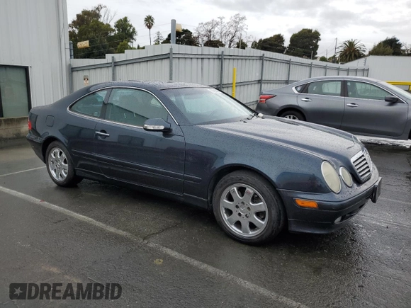 2000 Mercedes-Benz CLK 320/430 with VIN WDBLJ65GXYF158128, listed as a Copart auction lot 85065964 with 244,551 mi miles and Salvage Title. Bid and sale history available at DreamBid. Image 4.