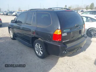 2008 GMC Envoy Denali with VIN 1GKET63M782214289, listed as a IAAI auction lot 42094430 with 250,000 mi miles. Bid and sale history available at carsss.com. Image 3.