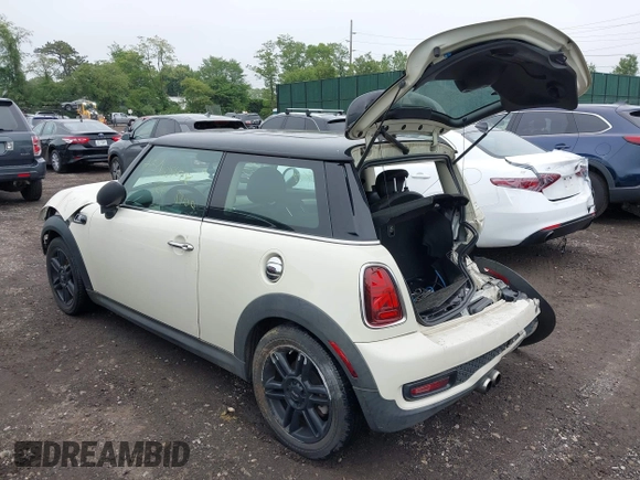 2013 MINI Hardtop S with VIN WMWSV3C51DT480022, listed as a IAAI auction lot 42398793 with Not provided miles and . Bid and sale history available at DreamBid. Image 3.