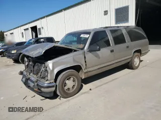 1999 GMC Suburban with VIN 3GKEC16R7XG542862, listed as a Copart auction lot 77568734 with 251,717 mi miles and Salvage Title. Bid and sale history available at carsss.com. Image 1.