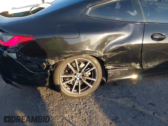 2022 BMW 4 Series 430i xDrive with VIN WBA73AP00NCJ16822, listed as a IAAI auction lot 41329235 with 30,570 mi miles and . Bid and sale history available at DreamBid. Image 6.