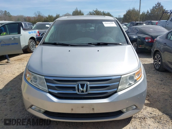 2012 Honda Odyssey Touring with VIN 5FNRL5H92CB108690, listed as a IAAI auction lot 41826580 with 150,327 mi miles and . Bid and sale history available at DreamBid. Image 12.
