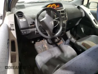 2010 Toyota Yaris z VIN JTDJT4K39A5292522, wystawiony jako Copart lot #58588655 z przebiegiem 115 909 mil mil oraz Szkoda całkowita • Salvage title. Historia ofert i sprzedaży dostępna na DreamBid. Obrazek 8.