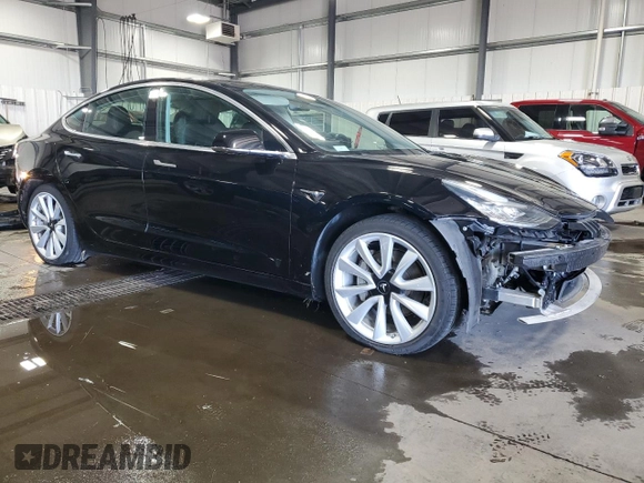 2019 Tesla Model 3 Mid Range z VIN 5YJ3E1EA4KF310792, wystawiony jako Copart lot #53031595 z przebiegiem 99 799 mil mil oraz Szkody całkowita. Historia ofert i sprzedaży dostępna na DreamBid. Obrazek 4.