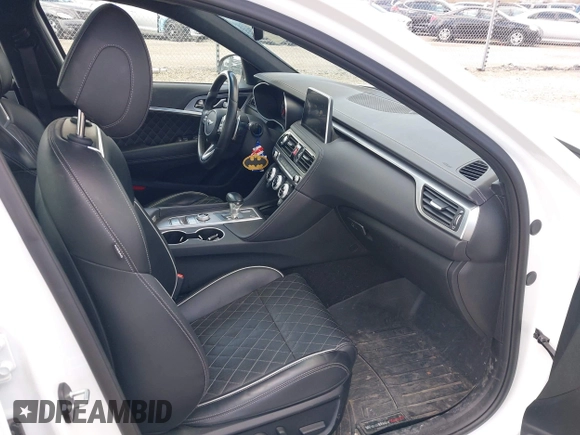 2021 Genesis G70 3.3T with VIN KMTG34LEXMU076278, listed as a IAAI auction lot 41976406 with 44,684 mi miles and . Bid and sale history available at DreamBid. Image 5.
