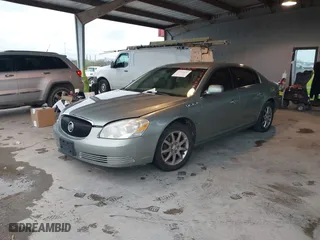 2006 Buick Lucerne CXL with VIN 1G4HD57206U134967, listed as a IAAI auction lot 41959692 with 141,957 mi miles. Bid and sale history available at carsss.com. Image 2.