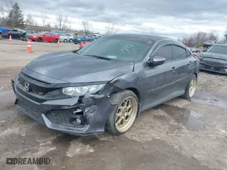 2019 Honda Civic Si Sedan with VIN 2HGFC1E59KH703592, listed as a IAAI auction lot 38735418 with 103,791 mi miles. Bid and sale history available at carsss.com. Image 2.