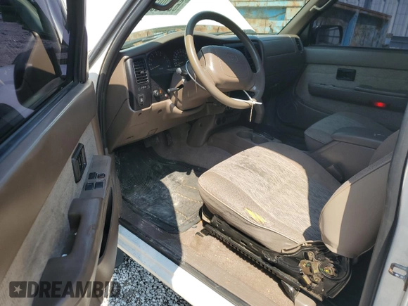 1999 Toyota Tacoma PreRunner with VIN 4TASN92NXXZ551335, listed as a Copart auction lot 62199645 with 198,754 mi miles and Salvage title. Bid and sale history available at DreamBid. Image 8.