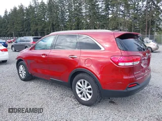 2016 Kia Sorento LX with VIN 5XYPGDA59GG180661, listed as a IAAI auction lot 42068449 with 158,463 mi miles. Bid and sale history available at carsss.com. Image 3.
