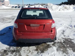 2009 Suzuki SX4 Man Touring Pkg AWD with VIN JS2YB417295100669, listed as a Copart auction lot 47551655 with 161,411 mi miles and Salvage Title. Bid and sale history available at carsss.com. Image 6.
