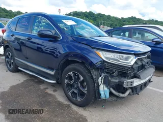 2019 Honda CR-V Touring with VIN 2HKRW2H92KH607057, listed as a IAAI auction lot 42497672 with 186,639 mi miles and . Bid and sale history available at DreamBid. Image 1.