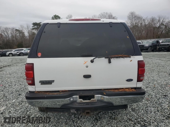 1997 Ford Expedition XLT with VIN 1FMEU17L5VLB80125, listed as a Copart auction lot 83892824 with 257,738 mi miles and Salvage title. Bid and sale history available at DreamBid. Image 6.