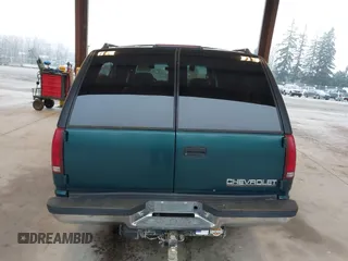 1997 Chevrolet Suburban with VIN 3GNFK16R6VG118242, listed as a IAAI auction lot 41349416 with 183,439 mi miles. Bid and sale history available at carsss.com. Image 16.