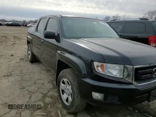 2011 Honda Ridgeline RT z VIN 5FPYK1F20BB006775, wystawiony jako Copart lot #44704755 z przebiegiem 148 843 mil mil oraz Szkoda całkowita • Salvage title. Historia ofert i sprzedaży dostępna na DreamBid. Obrazek 11.