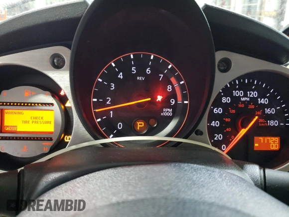 2012 Nissan 370Z z VIN JN1AZ4EH2CM564443, wystawiony jako Copart lot #45126885 z przebiegiem 71 729 mil mil oraz Szkody całkowita. Historia ofert i sprzedaży dostępna na DreamBid. Obrazek 9.