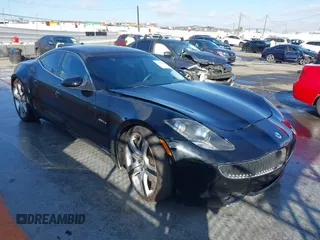 2012 Fisker Karma EcoSport z VIN YH4K14AAXCA000595, wystawiony jako IAAI lot #41491240 z przebiegiem 82 792 mil mil oraz . Historia ofert i sprzedaży dostępna na DreamBid. Obrazek 1.