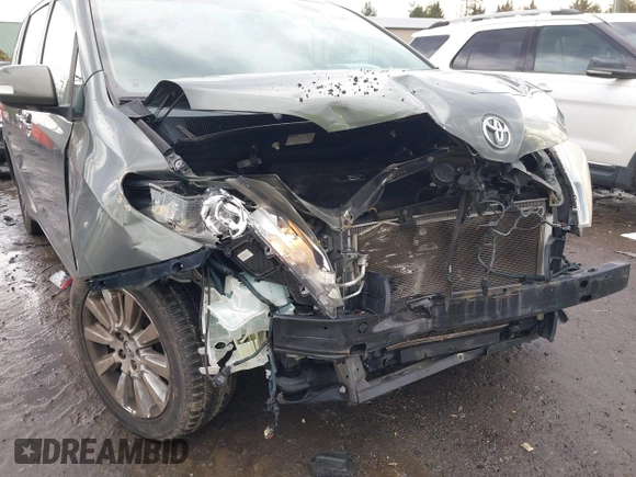 2013 Toyota Sienna XLE with VIN 5TDDK3DC7DS068591, listed as a IAAI auction lot 41483280 with 197,599 mi miles and . Bid and sale history available at DreamBid. Image 6.