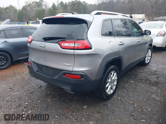 2016 Jeep Cherokee Latitude with VIN 1C4PJLCS7GW336973, listed as a IAAI auction lot 41769839 with 89,805 mi miles. Bid and sale history available at carsss.com. Image 4.
