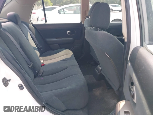 2010 Nissan Versa S with VIN 3N1BC1AP8AL415222, listed as a IAAI auction lot 42400894 with 124,129 mi miles and . Bid and sale history available at DreamBid. Image 8.