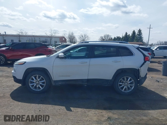 2015 Jeep Cherokee Limited with VIN 1C4PJMDS7FW522581, listed as a IAAI auction lot 41870516 with 143,904 mi miles and . Bid and sale history available at DreamBid. Image 14.