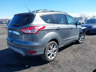 2013 Ford Escape SEL with VIN 1FMCU9H97DUD30608, listed as a IAAI auction lot 41800073 with 102,180 mi miles. Bid and sale history available at carsss.com. Image 4.