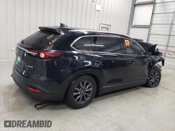 2021 Mazda CX-9 Touring with VIN JM3TCACY4M0523188, listed as a Copart auction lot 48595205 with 99,999 mi miles and Clean title. Bid and sale history available at DreamBid. Image 3.